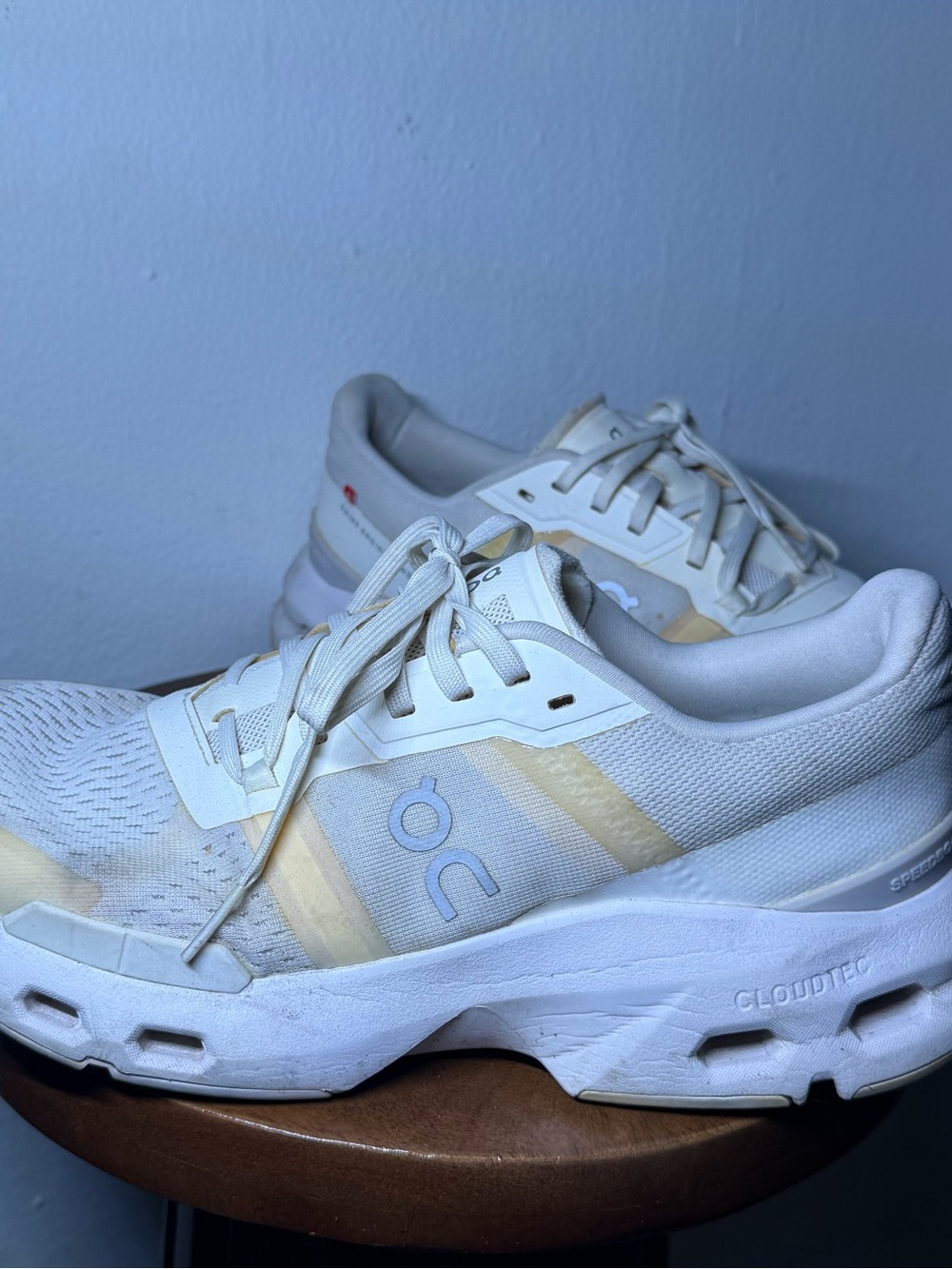 On Running White and Cream Trainer Label Detail